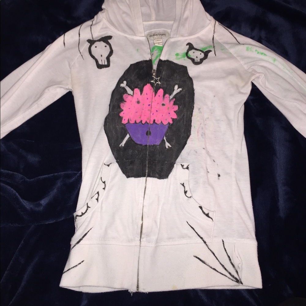 Painted sweater with snakes, cupcake and mushroom